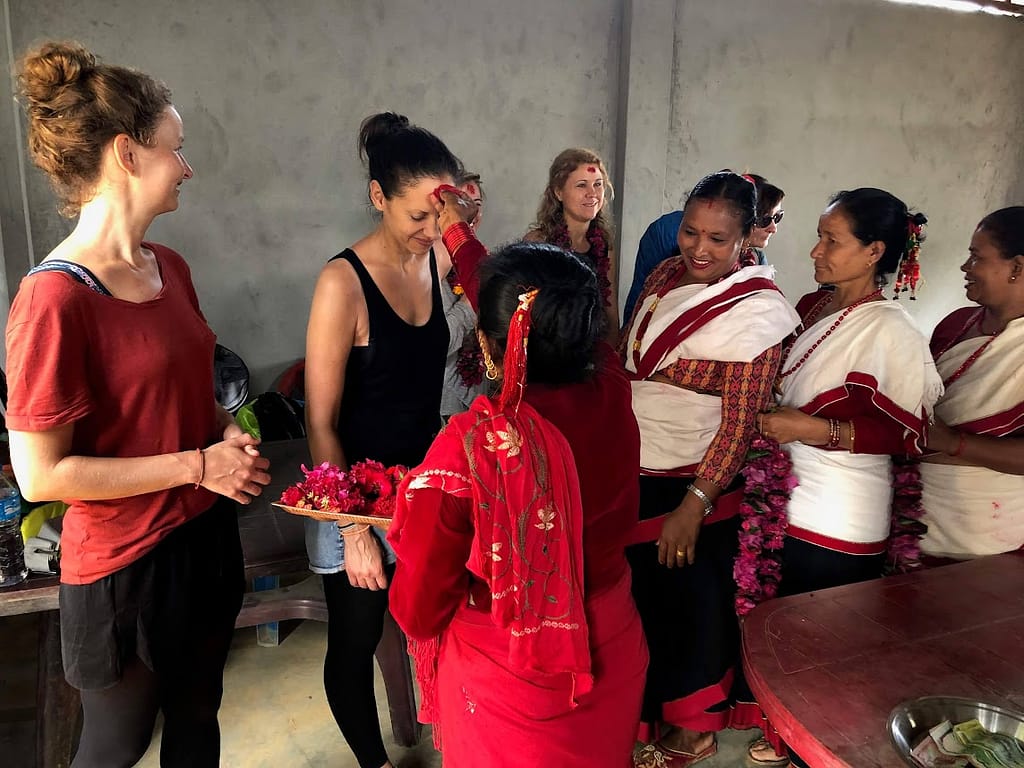 welcome program to tourists by local nepali women